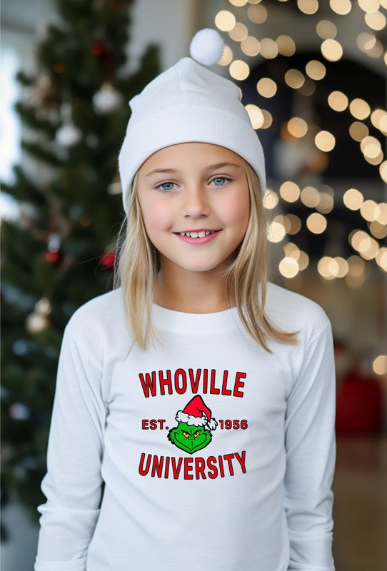 Child wearing a white long-sleeve shirt with 'WHOVILLE UNIVERSITY' text and a Grinch graphic.
