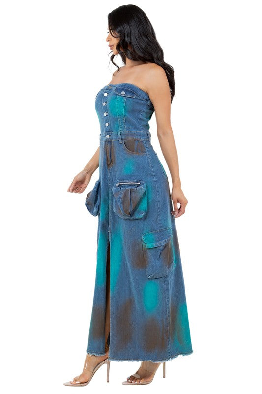 Women’s strapless denim maxi dress with button-front closure, front slit, and oversized utility pockets.
