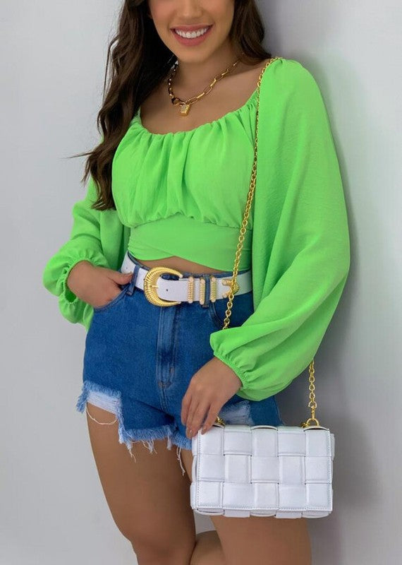 Solid green color – easy to pair with different bottoms.