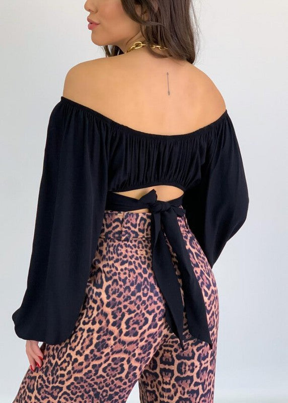 Open back, off shoulder detail. Easy to dress up with accessories or keep minimal.