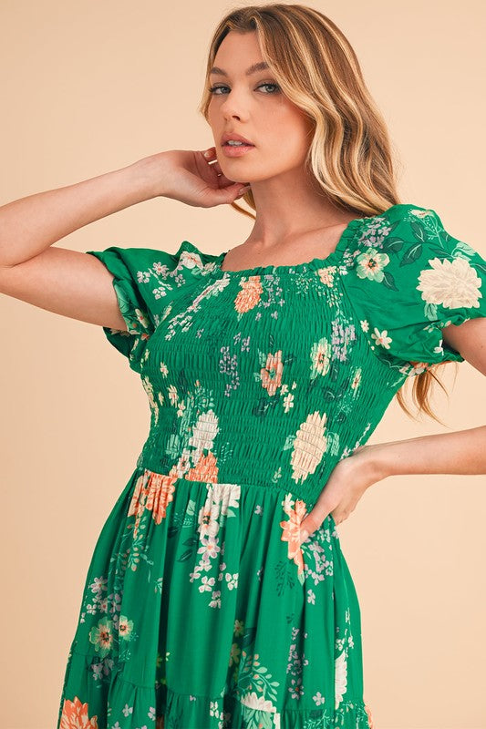 Casual spring or vacation dress, midi length, featuring a flattering smocked top and all-over flower pattern.