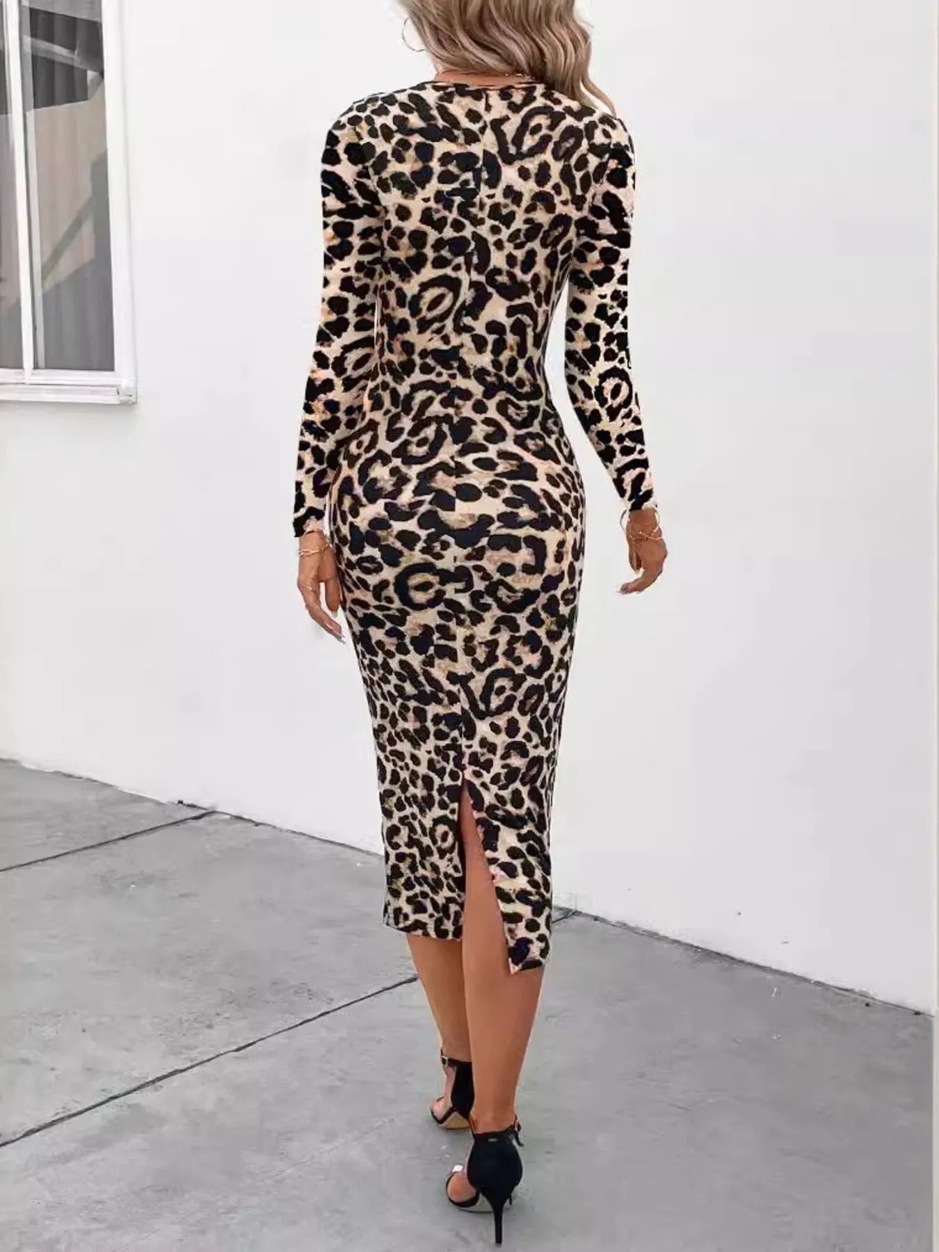 Women's leopard print midi dress with long sleeves and a bodycon fit for fall.