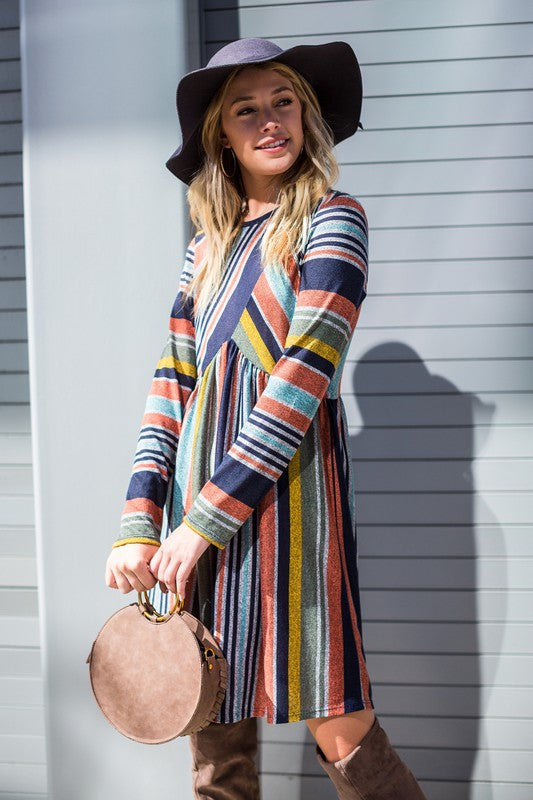 Women's long sleeve knit dress with multi-stripe pattern, A-line skirt, and empire waist.