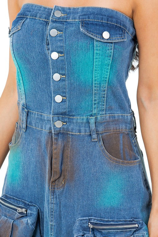 Close up of Women’s strapless denim maxi dress with button-front closure, front slit, and oversized utility pockets.