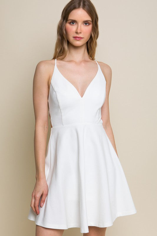 White backless skater dress, front