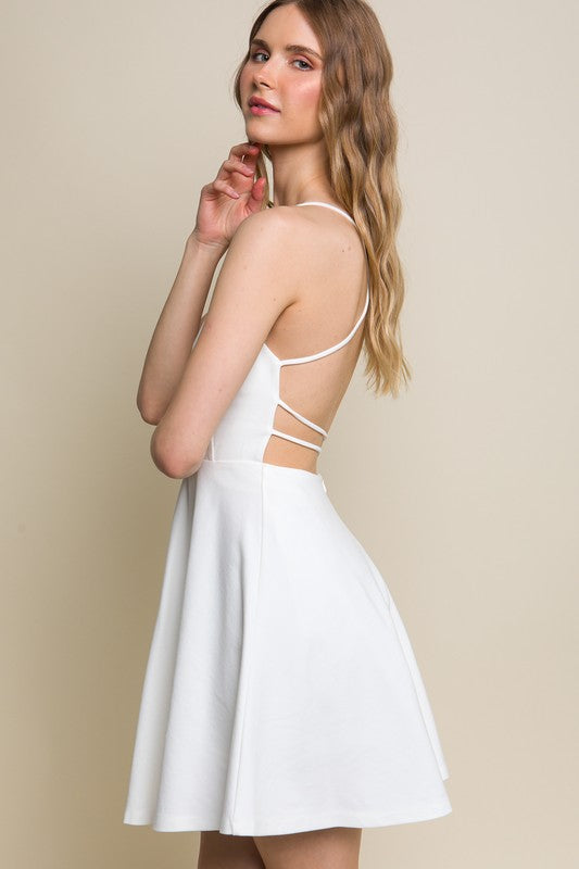 White backless skater dress, side
