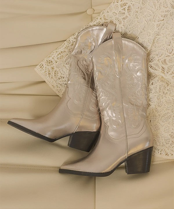 western boots featuring intricate embroidered patterns, pointed toe, block heel, and traditional pull tabs.
