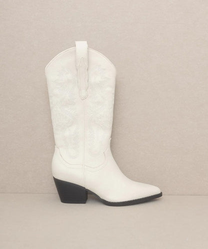 western boots featuring intricate embroidered patterns, pointed toe, block heel, and traditional pull tabs.