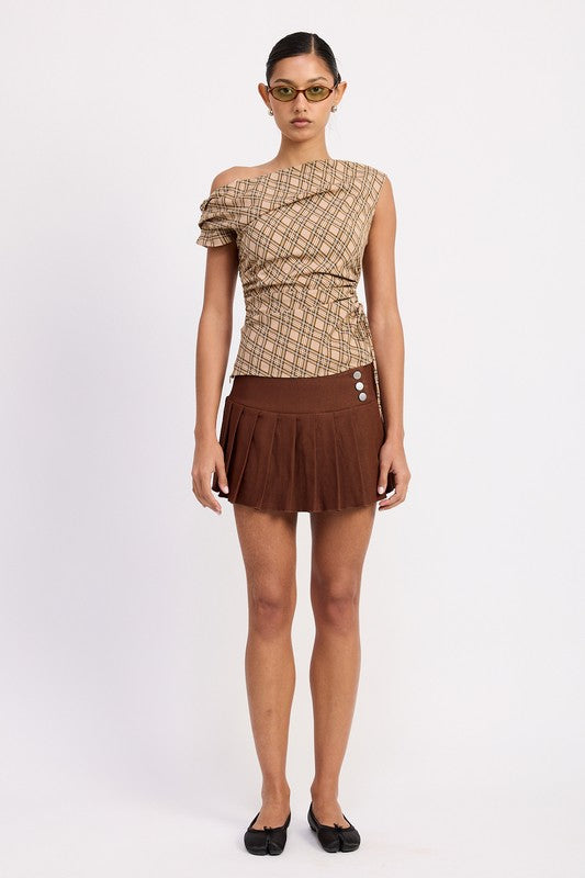 The model typically wears size Small; asymmetry and ruching help the piece adapt to your shape. 