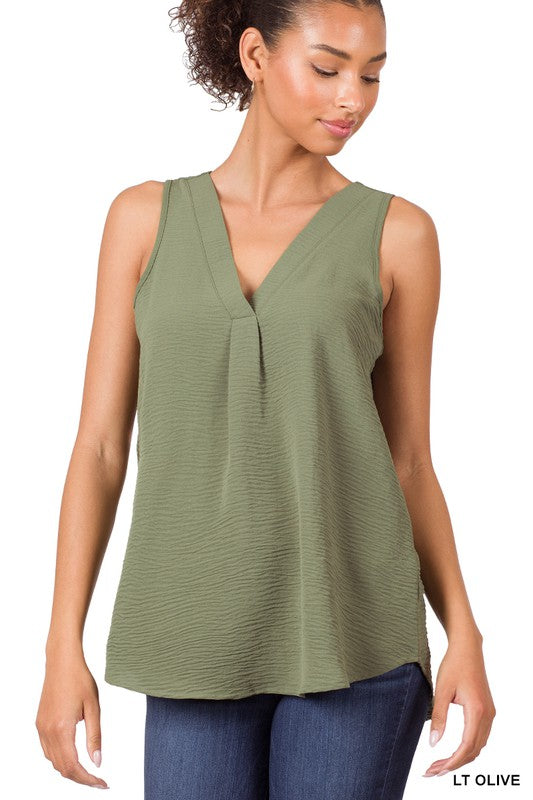 Sleeveless cut — ideal for warm weather or layering. 