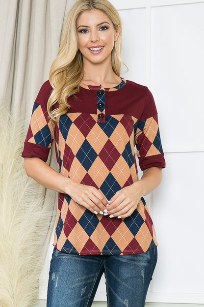Classic argyle print meets button-front styling in this jersey knit top.