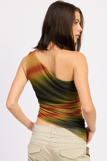 Statement top that blends comfort with eye-catching detail.