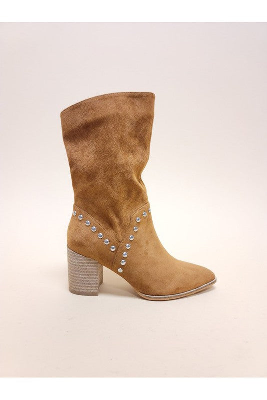 Slouchy knee-high boots in suede featuring metal stud trim, pointed toe silhouette, and chunky stacked heel design