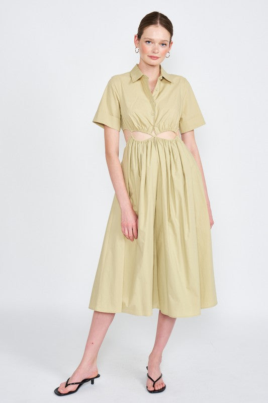 Woman models a stylish olive green midi dress with a collar, short sleeves, and fashionable cut-outs.