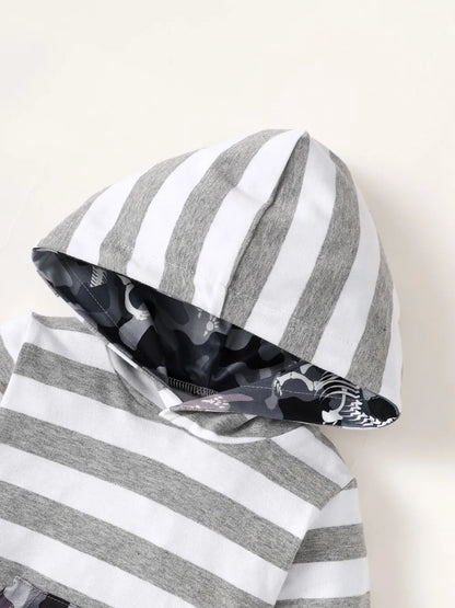 Striped hoodie with camouflage lining on a white background