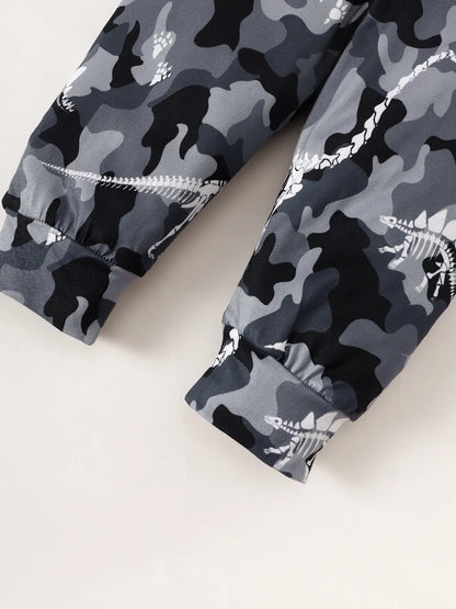 Gray camouflage pants with white accents on a light background