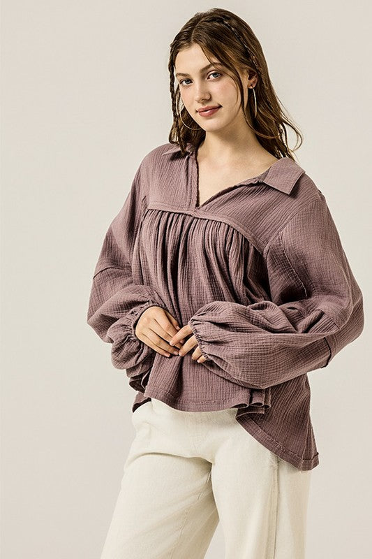 A standout top that blends comfort, boho charm, and feminine style.