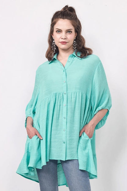 Collared neckline adds polished structure to the tunic look. 