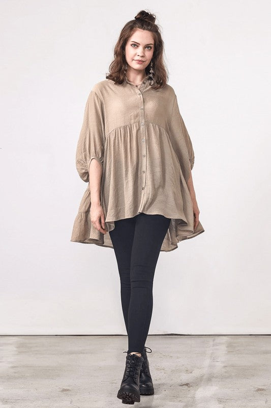 Soft drape and babydoll waistline that accentuate flow over the body.
