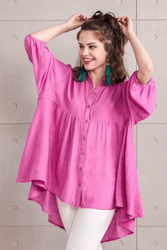 Relaxed oversized babydoll silhouette for a flowy, flattering drape. 