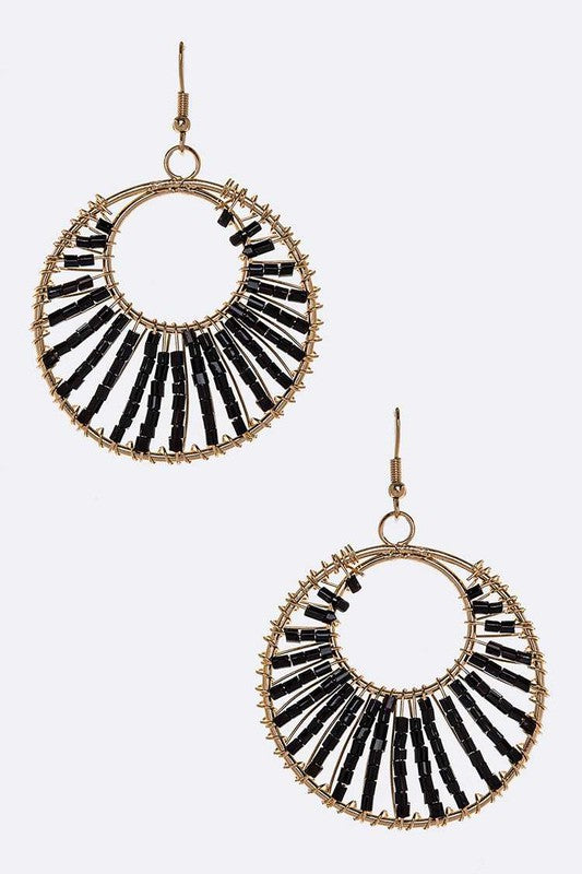 Art meets elegance. These Beaded Wired Fashion Earrings are a celebration of handcrafted beauty, combining delicate wirework with vibrant beads for a look that’s both bold and refined. Whether you're dressing up for a gallery opening or adding flair to your everyday outfit, these earrings are wearable ar