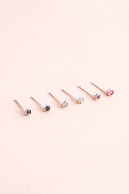Sparkle in every size. The Bedazzled Stone Stud Earring Set in Silver features a curated collection of shimmering studs, each designed to add a touch of glam to your everyday or evening look. Whether you're layering multiple piercings or switching up your style, this set gives you options that shine.
