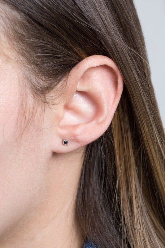 Sparkle in every size. The Bedazzled Stone Stud Earring Set in Silver features a curated collection of shimmering studs, each designed to add a touch of glam to your everyday or evening look. Whether you're layering multiple piercings or switching up your style, this set gives you options that shine.