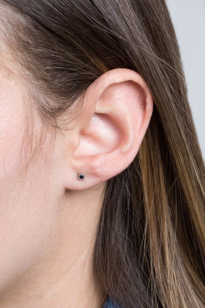 Sparkle in every size. The Bedazzled Stone Stud Earring Set in Silver features a curated collection of shimmering studs, each designed to add a touch of glam to your everyday or evening look. Whether you're layering multiple piercings or switching up your style, this set gives you options that shine.