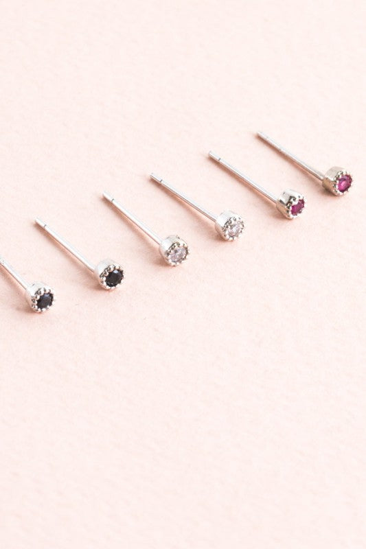 Sparkle in every size. The Bedazzled Stone Stud Earring Set in Silver features a curated collection of shimmering studs, each designed to add a touch of glam to your everyday or evening look. Whether you're layering multiple piercings or switching up your style, this set gives you options that shine.