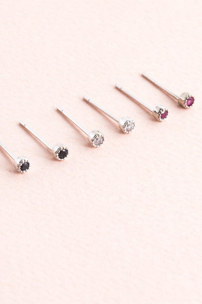 Sparkle in every size. The Bedazzled Stone Stud Earring Set in Silver features a curated collection of shimmering studs, each designed to add a touch of glam to your everyday or evening look. Whether you're layering multiple piercings or switching up your style, this set gives you options that shine.