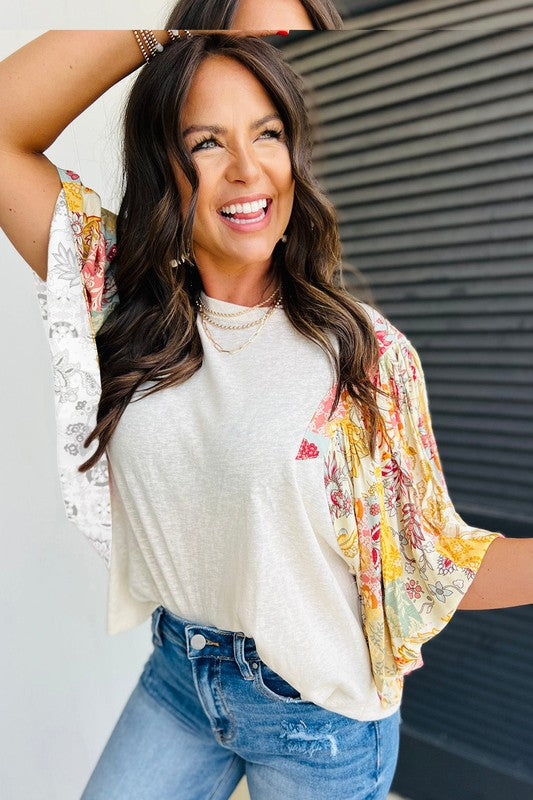 Round neckline keeps the look balanced and wearable. 