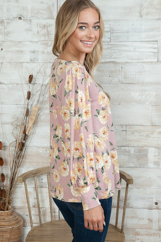 This light sweater combines everyday comfort with graceful bell-sleeve detailing.