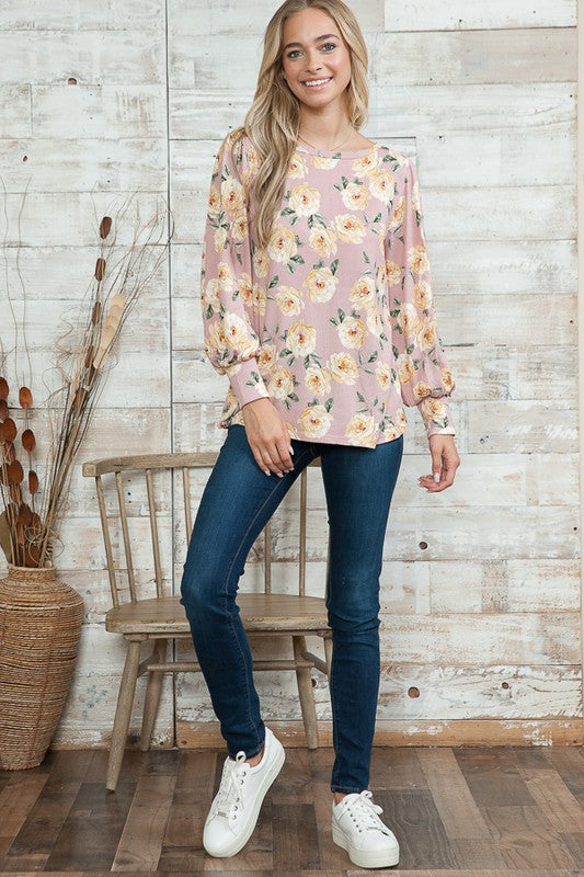 Designed with feminine bell sleeves, this pullover balances comfort with modern style.