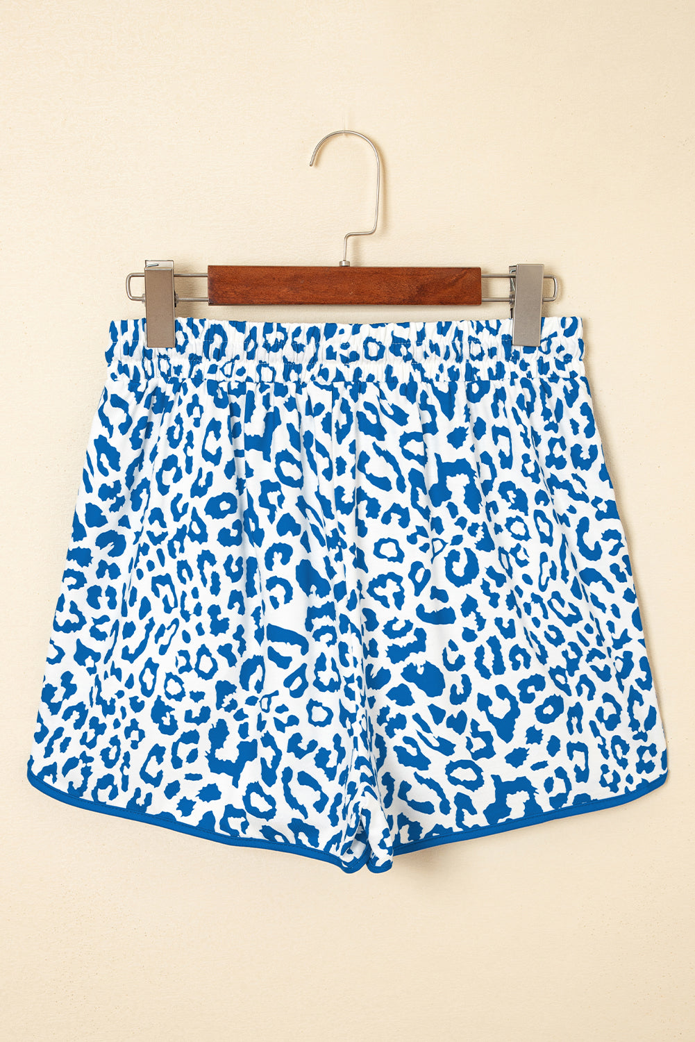 Fierce meets functional. These Blue Leopard Lace-Up Shorts are designed to turn heads with their wild print and sporty silhouette. Featuring a stretchy waistband, lace-up front, and bold contrast trim, they’re perfect for casual days, festival looks, or street-style slayage.