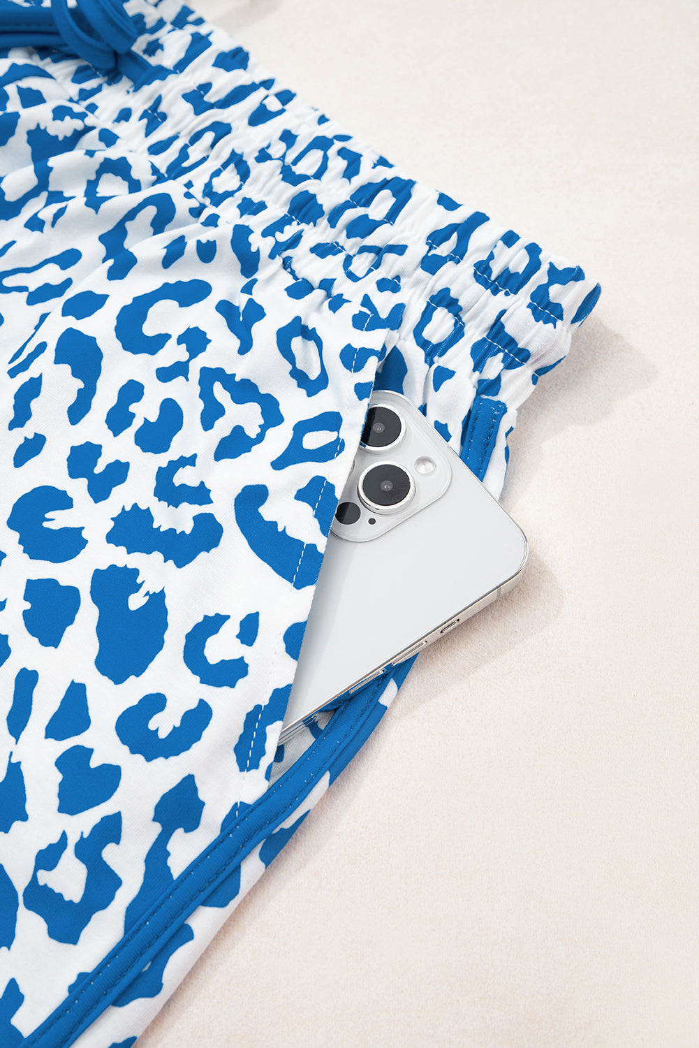 Fierce meets functional. These Blue Leopard Lace-Up Shorts are designed to turn heads with their wild print and sporty silhouette. Featuring a stretchy waistband, lace-up front, and bold contrast trim, they’re perfect for casual days, festival looks, or street-style slayage.