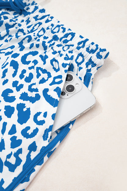 Fierce meets functional. These Blue Leopard Lace-Up Shorts are designed to turn heads with their wild print and sporty silhouette. Featuring a stretchy waistband, lace-up front, and bold contrast trim, they’re perfect for casual days, festival looks, or street-style slayage.