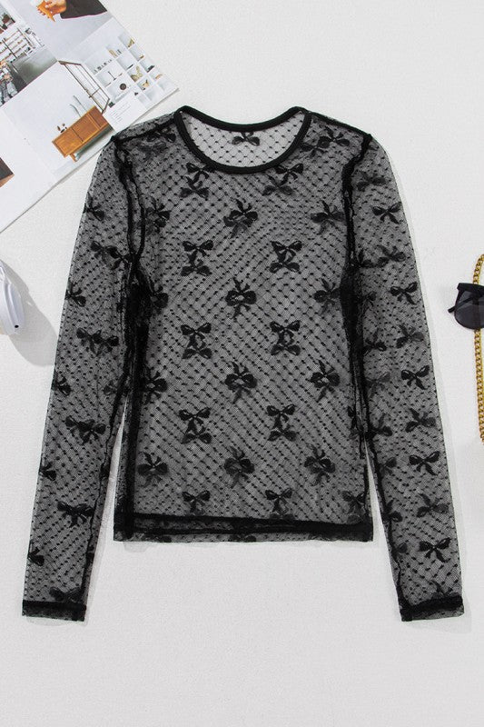 Long sleeves in mesh add allure while bow pattern brings feminine charm.