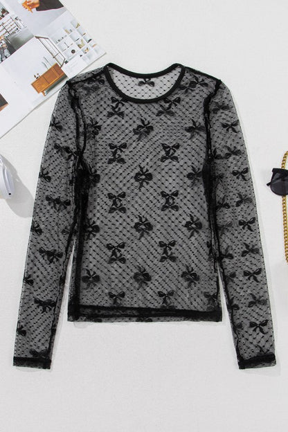 Long sleeves in mesh add allure while bow pattern brings feminine charm.