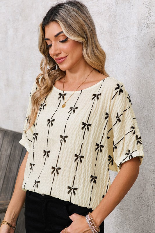 Round neckline enhances versatility and style.