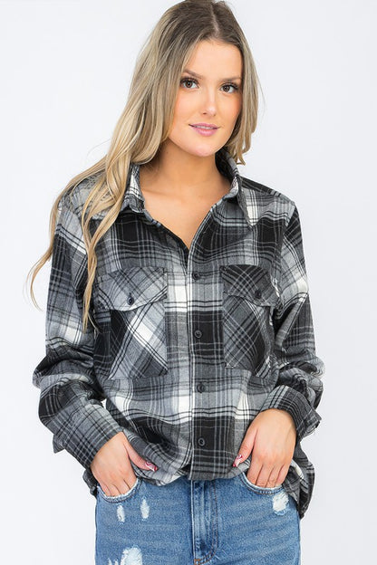 Dual chest pockets add functional style details.