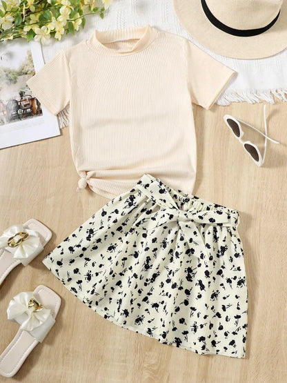 Breezy chic summer set with matching top and bottom in lightweight fabric, designed for comfort and style in warm weather

