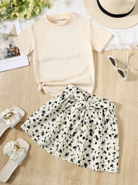 Breezy chic summer set with matching top and bottom in lightweight fabric, designed for comfort and style in warm weather

