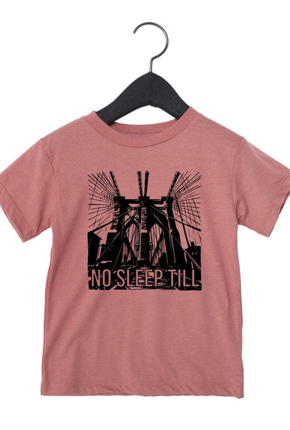 Pink t-shirt with black graphic design on a hanger against a white background