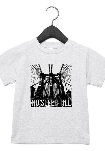 White t-shirt with black graphic design and 'No Sleep Till' text on a hanger against a white background