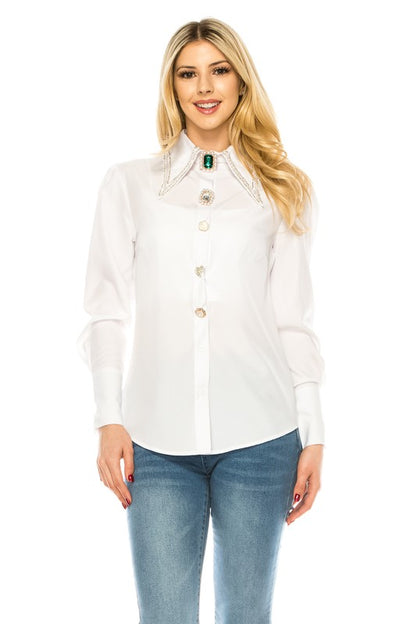 Long sleeves with cuffed wrists for a polished finish.