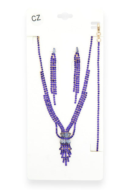 Jewelry set featuring a V-shaped necklace, matching earrings, and bracelet adorned with vibrant blue gemstones set in gold-toned metal—striking, symmetrical, and ideal for formal or festive occasions.