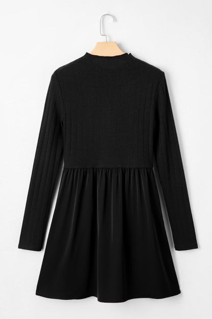 Back view of a casual ribbed knit long sleeve dress. 