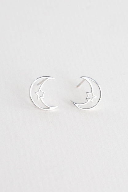 Moonlight meets starlight. The Celestial Unity Earrings in Silver celebrate harmony between cosmic forces. Featuring delicate moon and star motifs in a sleek silver finish, these earrings are perfect for dreamers, stargazers, and anyone drawn to the magic of the night sky.