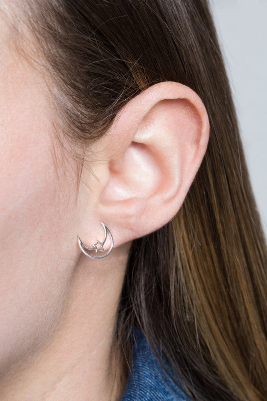 Moonlight meets starlight. The Celestial Unity Earrings in Silver celebrate harmony between cosmic forces. Featuring delicate moon and star motifs in a sleek silver finish, these earrings are perfect for dreamers, stargazers, and anyone drawn to the magic of the night sky.