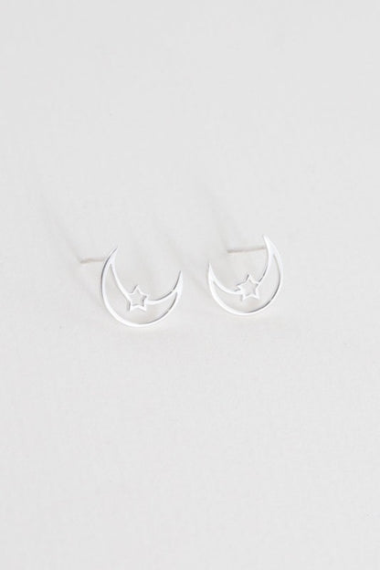 Moonlight meets starlight. The Celestial Unity Earrings in Silver celebrate harmony between cosmic forces. Featuring delicate moon and star motifs in a sleek silver finish, these earrings are perfect for dreamers, stargazers, and anyone drawn to the magic of the night sky.